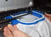 Anchor the hoop in the embroidery machine